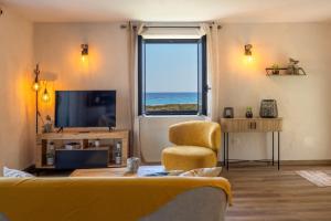 TV a/nebo společenská místnost v ubytování Villa Marine de Meria