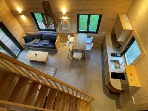 an overhead view of a living room and dining room at Sikana Mõisa saun in Sikana