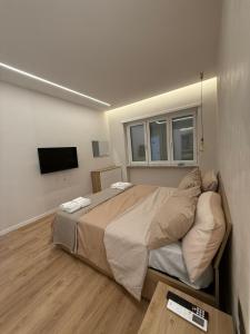 TV a/nebo společenská místnost v ubytování Destina Apartments