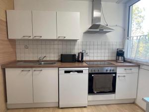 Dapur atau dapur kecil di Ferienwohnung Alpenherz