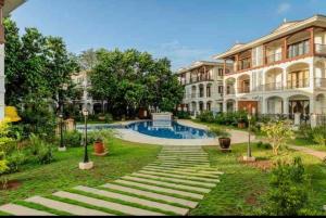 Πισίνα στο ή κοντά στο Raina Villas Goa lux 8bhk pvt pool fully serviced