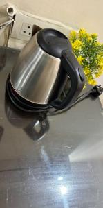 a tea kettle sitting on top of a counter at VRResidency in Gurgaon +71 photos
