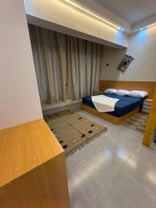 a bedroom with a bed in a room at Omars shalet in Dahab