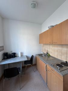 Kuchyň nebo kuchyňský kout v ubytování Nordstraße