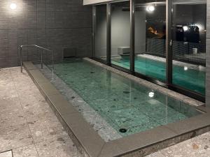 Bazén v ubytování Granbell Hotel Otaru nebo v jeho okolí