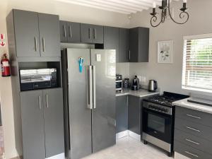 Køkken eller tekøkken på Bazley Heights