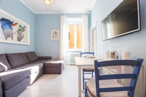 Μια τηλεόραση ή/και κέντρο ψυχαγωγίας στο Delizioso appartamento in centro a Camogli