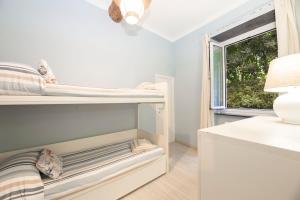 Ένα ή περισσότερα κρεβάτια σε δωμάτιο στο Delizioso appartamento in centro a Camogli