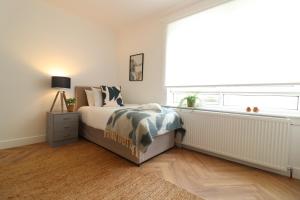 Postel nebo postele na pokoji v ubytování Signature - Oak House