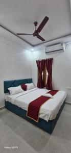 Ένα ή περισσότερα κρεβάτια σε δωμάτιο στο Varahi Stay Inn