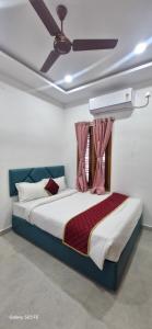 Ένα ή περισσότερα κρεβάτια σε δωμάτιο στο Varahi Stay Inn