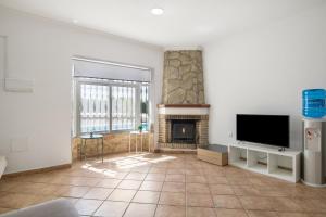 TV a/nebo společenská místnost v ubytování Chalet Independiete Con Piscina