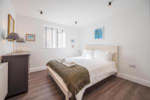 Ένα ή περισσότερα κρεβάτια σε δωμάτιο στο 1 Leiston Court, Leiston
