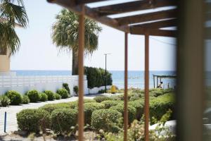 a view of the beach from a house at Lazuli Seafront Beach House Nr18 in Larnaca