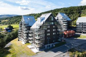 an aerial view of an apartment complex with buildings at Åre Travel - View in Åre