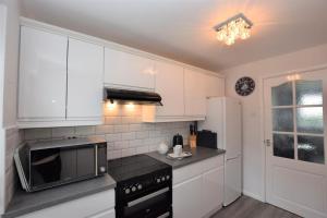 Kuchyň nebo kuchyňský kout v ubytování Summer Breeze + 11 fotografií