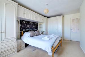 Postel nebo postele na pokoji v ubytování Summer Breeze