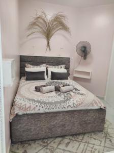 Ένα ή περισσότερα κρεβάτια σε δωμάτιο στο Boka Bay One