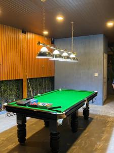 a pool table in a room with a ceiling at Sky Blue Pool Villa at Hua Hin 3Bedrooms and 4 Bathrooms near Cha-Am beach in Nikhom Sang Ton Eng Khuan Phet