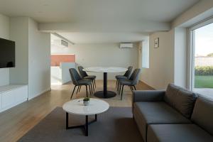 Istumisnurk majutusasutuses Ferme de Pétrieux - Gîte "Le Chêne" avec piscine et wellness