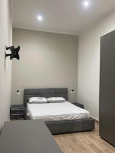 Ένα ή περισσότερα κρεβάτια σε δωμάτιο στο HomePreziuso luxury