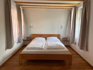 Postel nebo postele na pokoji v ubytování Rabenmühle