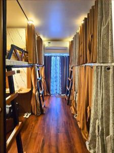 a room filled with lots of bunk beds at Davao Condo Bed Space - Safe, Affordable & Comfy in Davao City