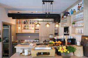 a kitchen with a counter with fruits on it at Oasis of Energy in Ljubljana