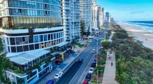 an aerial view of a city street with buildings and the ocean at Sky-High Sanctuary Ocean Views - Pet Friendly in Gold Coast