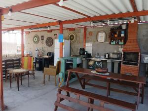 Příslušenství pro přípravu čaje a kávy v ubytování Casa da Paixão