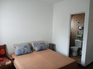 Postel nebo postele na pokoji v ubytování Casa da Paixão