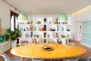 a dining room with a table and chairs at NEW!! Lugar das Letras in Sabrosa
