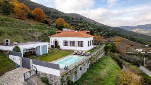 an aerial view of a house with a swimming pool at NEW!! Lugar das Letras in Sabrosa