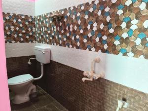 Ванная комната в Arumugam Residency