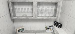 a shelf in a bathroom with wine glasses at City NOWA in Nürnberg +61 photos