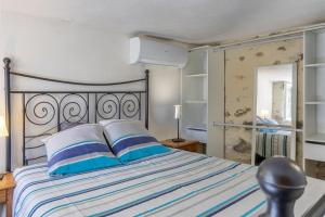 Postel nebo postele na pokoji v ubytování Casa Brésil in Corsica