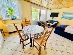 Posezení v ubytování Ferienhaus Ostseebrise + 11 fotografií