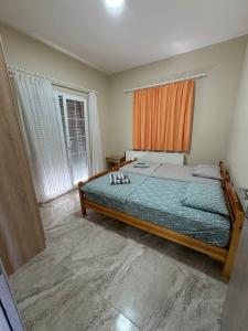 Кровать или кровати в номере Bungalow By Eftimiya +13 фотографий