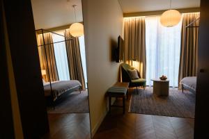 Postel nebo postele na pokoji v ubytování Grand Hotel Terminus