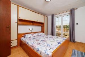 Ένα ή περισσότερα κρεβάτια σε δωμάτιο στο Apartments Ester +110 φωτογραφίες