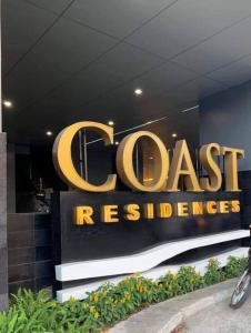 a sign for a dassaultresbestosbestos at Modern Comfort in Pasay with Pool in Manila