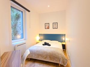 Postel nebo postele na pokoji v ubytování Le Sésame - Centre-Ville, Chic & Parking Gratuit