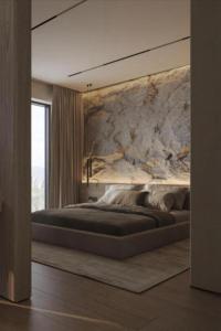 a bedroom with a large bed with a stone wall at Luxary Home Marriot Marquis in Baku +34 photos