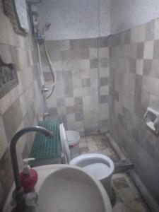 Ένα μπάνιο στο Quickshape Homestay