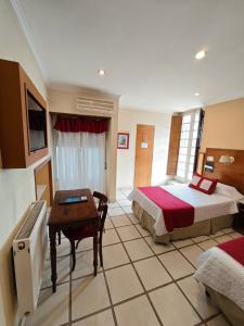 Katil atau katil-katil dalam bilik di Hotel Francia