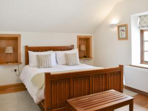 Postel nebo postele na pokoji v ubytování Badger Cottage - Uk47504