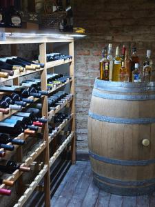 a room with a bunch of bottles of wine at Hotel Francia in Tandil +96 photos