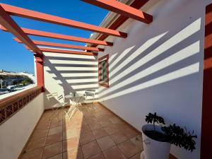 En balkon eller terrasse på Burgau Serenity