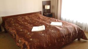 Posteľ alebo postele v izbe v ubytovaní Apartamenty Olympic Park