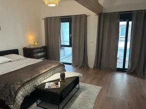 Postel nebo postele na pokoji v ubytování Maison Colmar, spacieuse, accueillante , confortable au calme